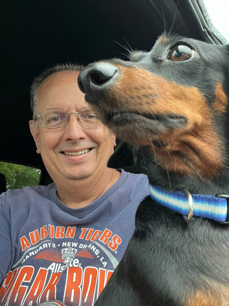 Zoey the Dachshund and her human on a car ride